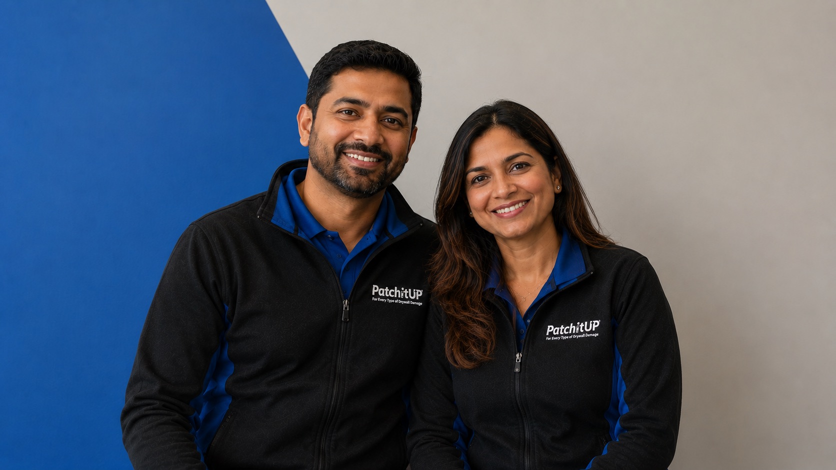 PatchitUP franchise owners smiling in branded jackets
